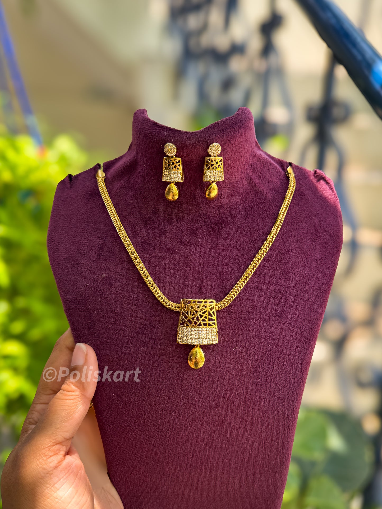 Diamond look square stone worked pendant and chain with earring set