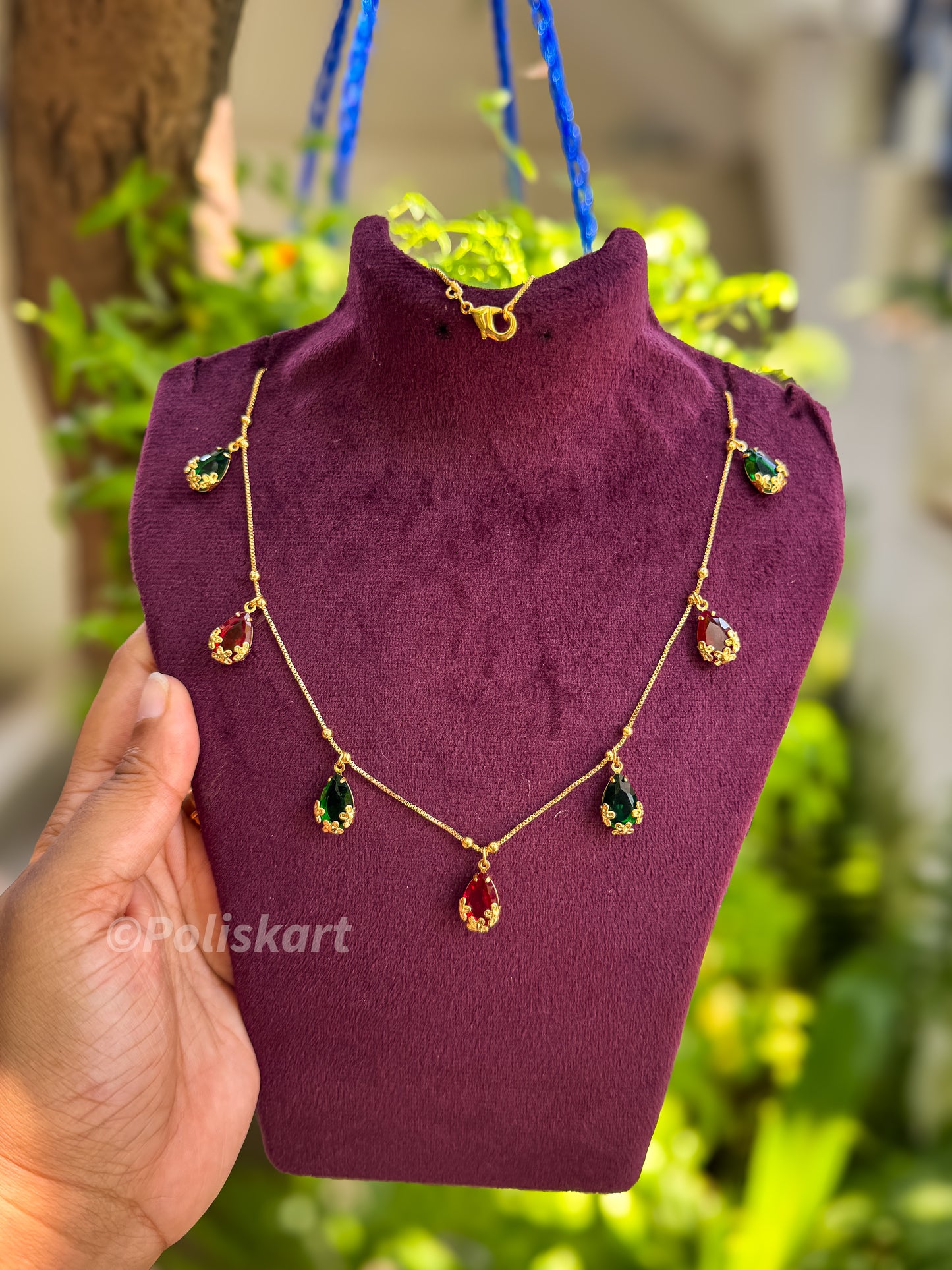 Green and red raindrop stones with chain