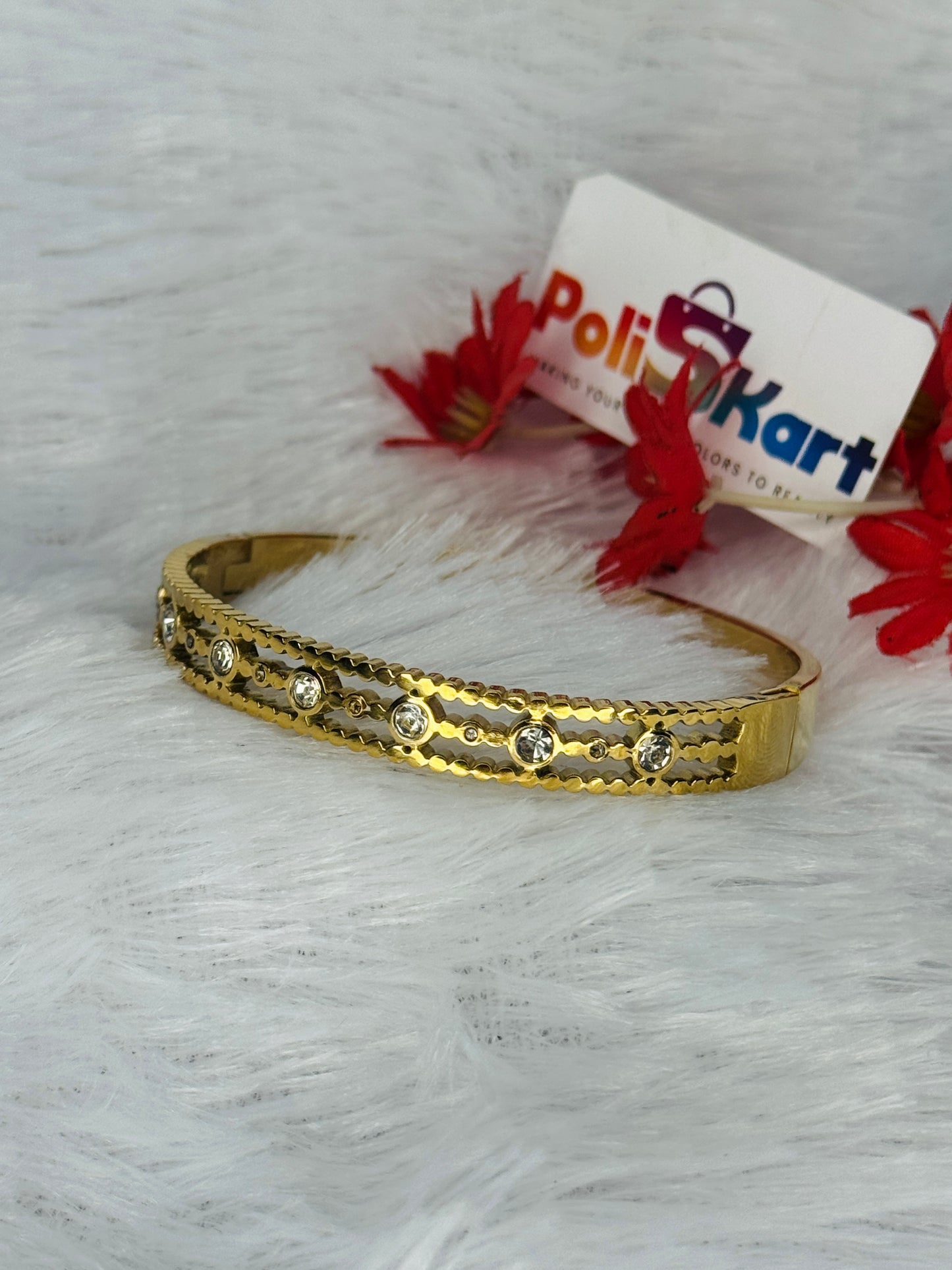 Cuff bangle with white stone design