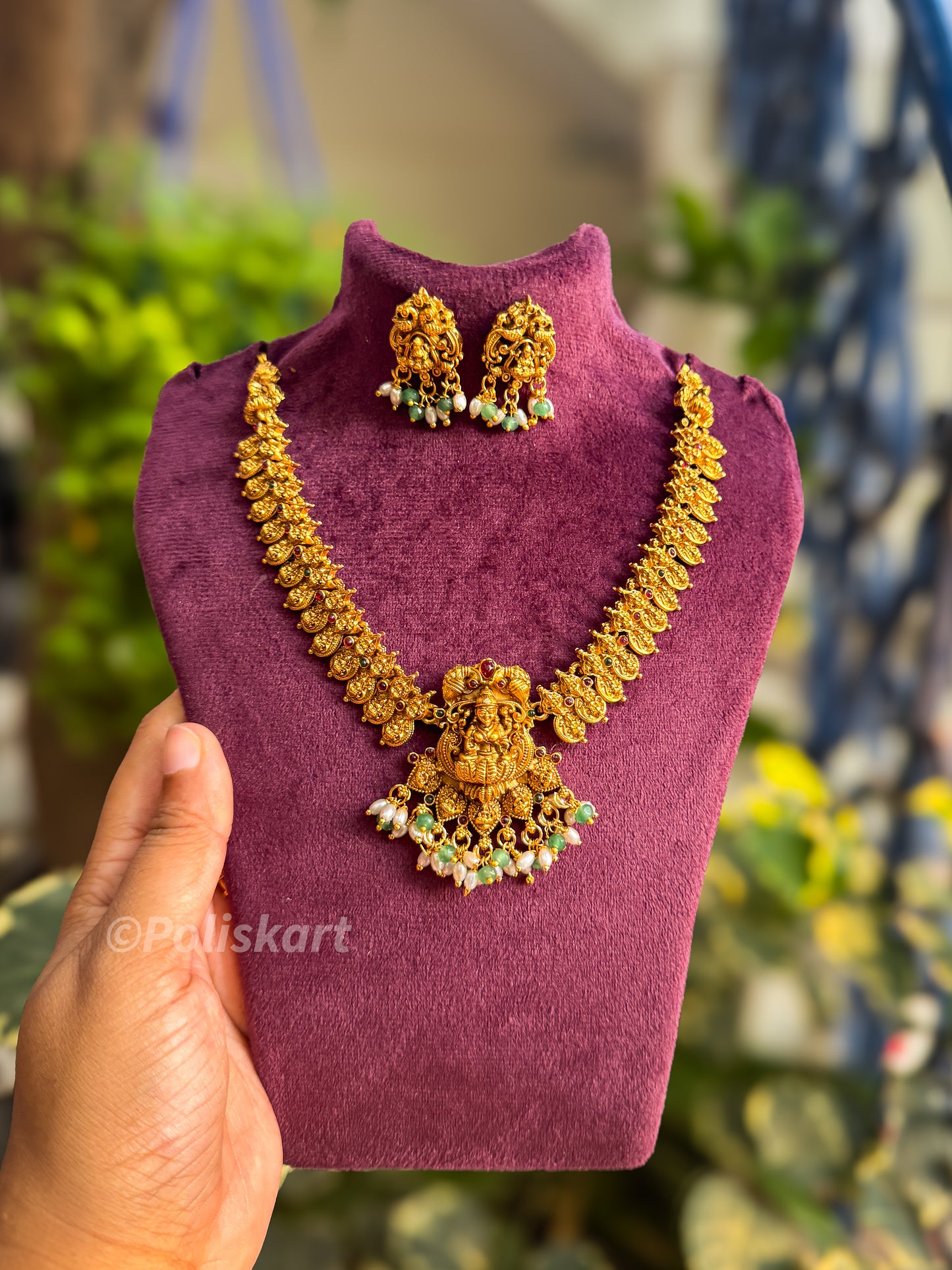 Gold finished kasumala and Lakshmi designed necklace with earring set