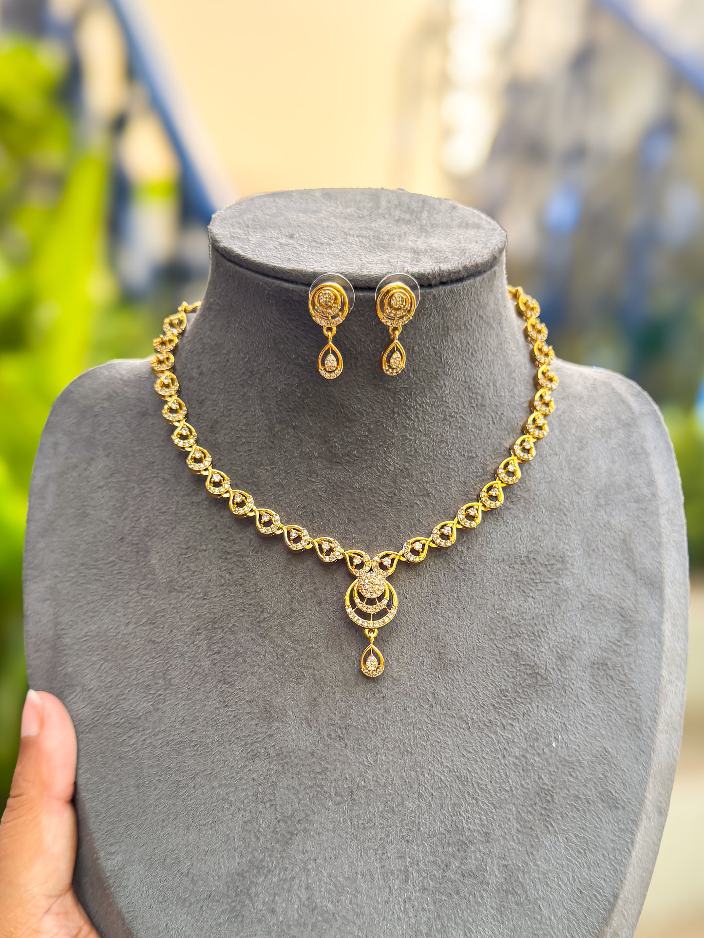 PK104 - Diamond finished white stone necklace with earring set