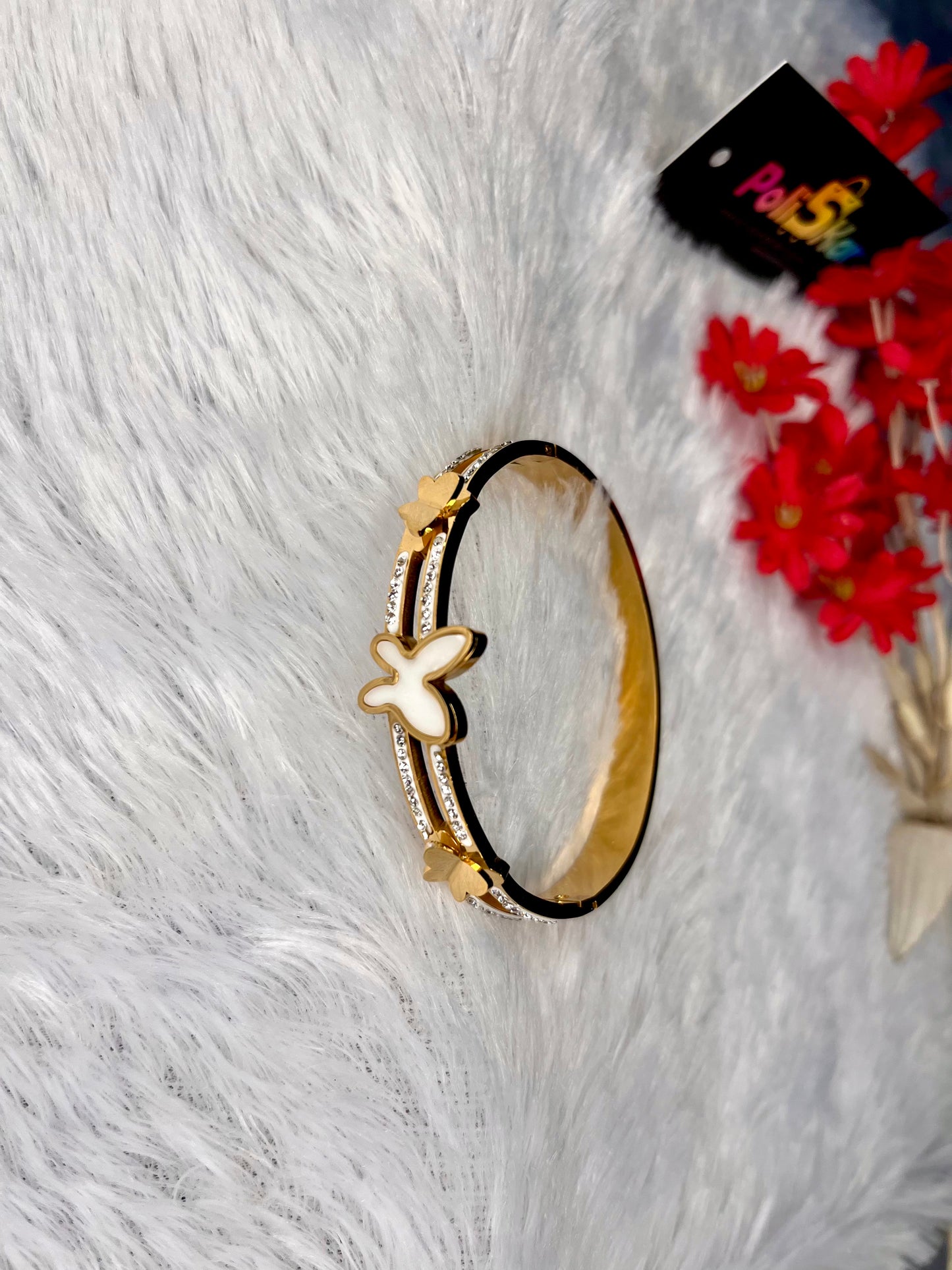 Cuff bangle with white butterfly design