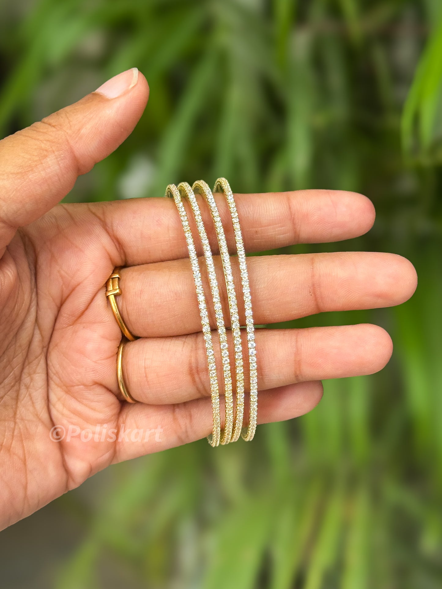 4 White stone worked diamond look like bangles
