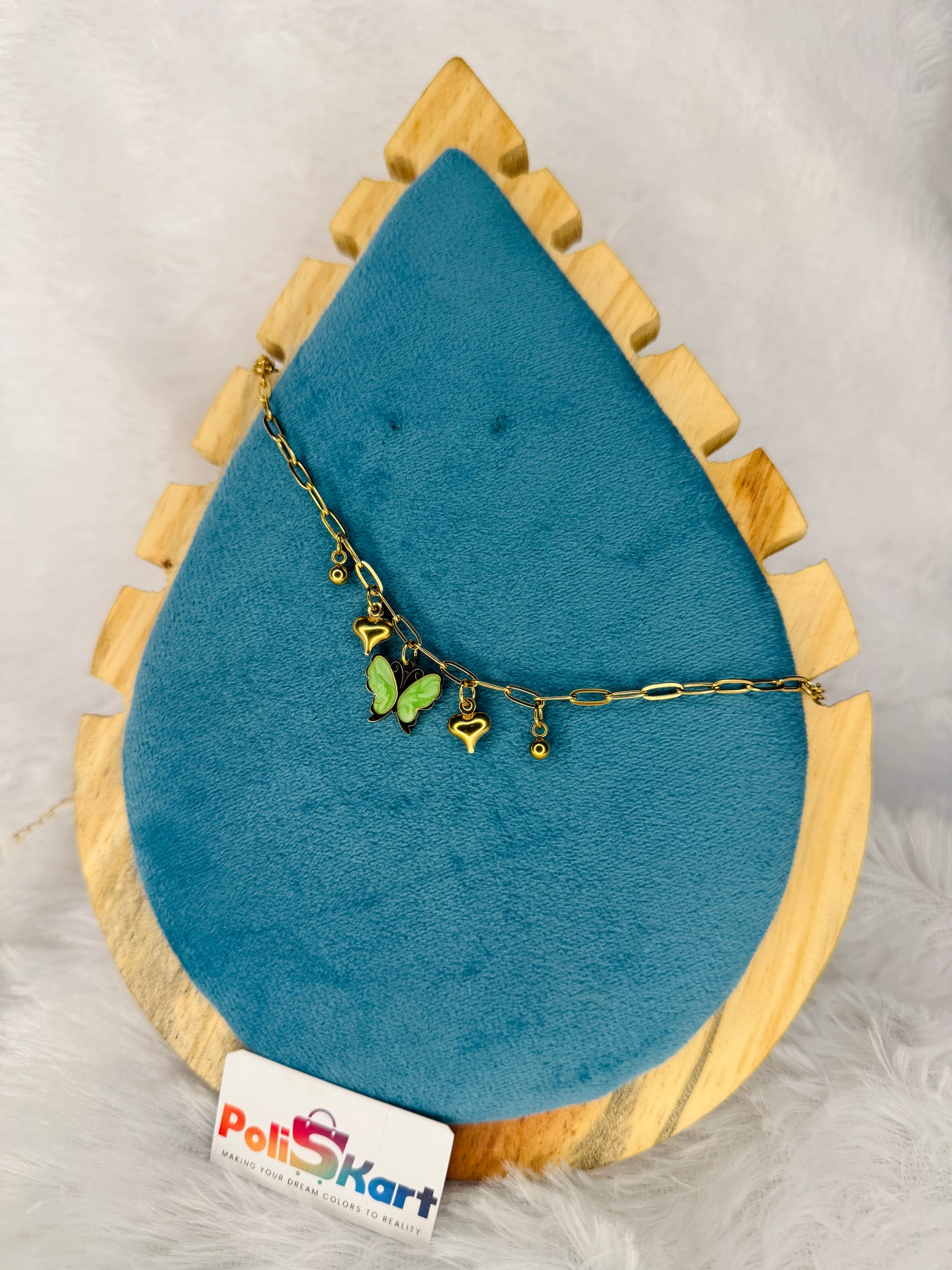 Bracelet - hanging green butterfly and stone design