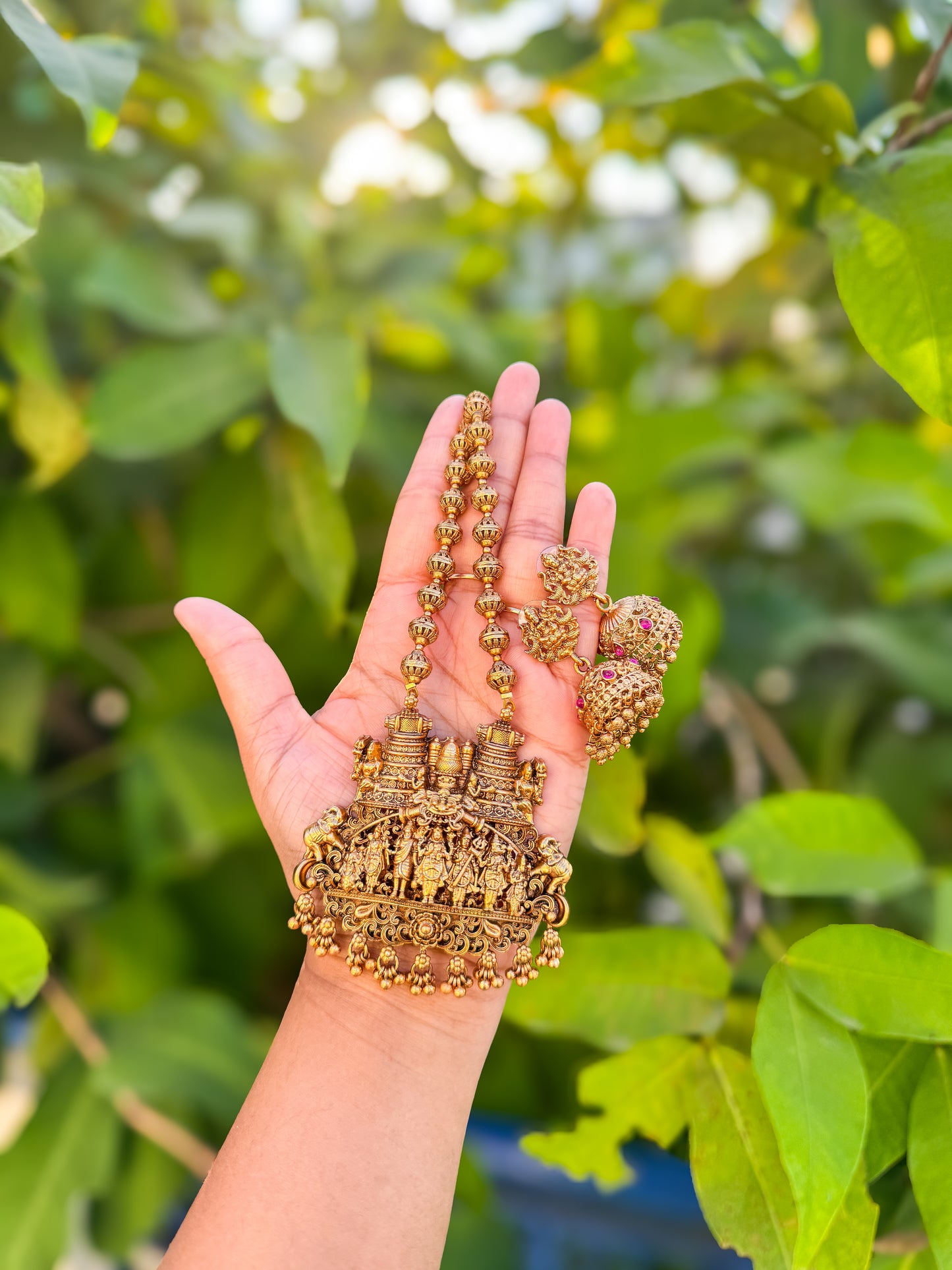Premium temple theme based short haram with jumka set