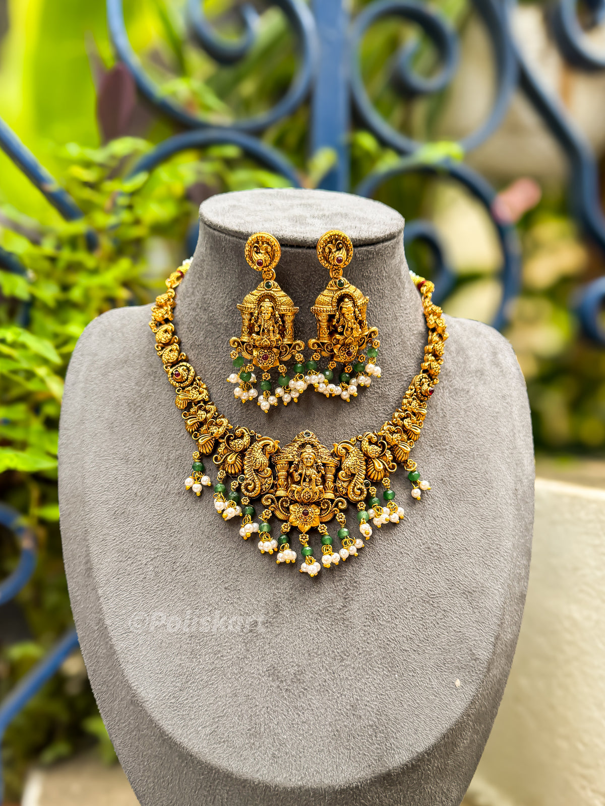 PK268 - Trending pearl worked lakshmi and peacock necklace with earring set