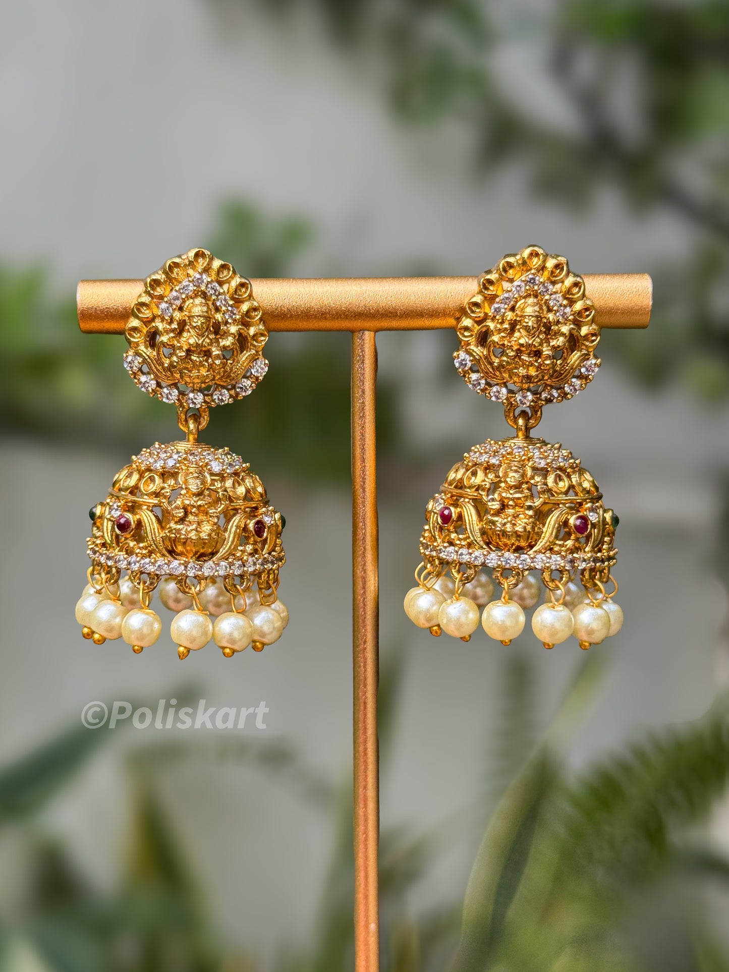 White small stone worked lakshmi jhumka set