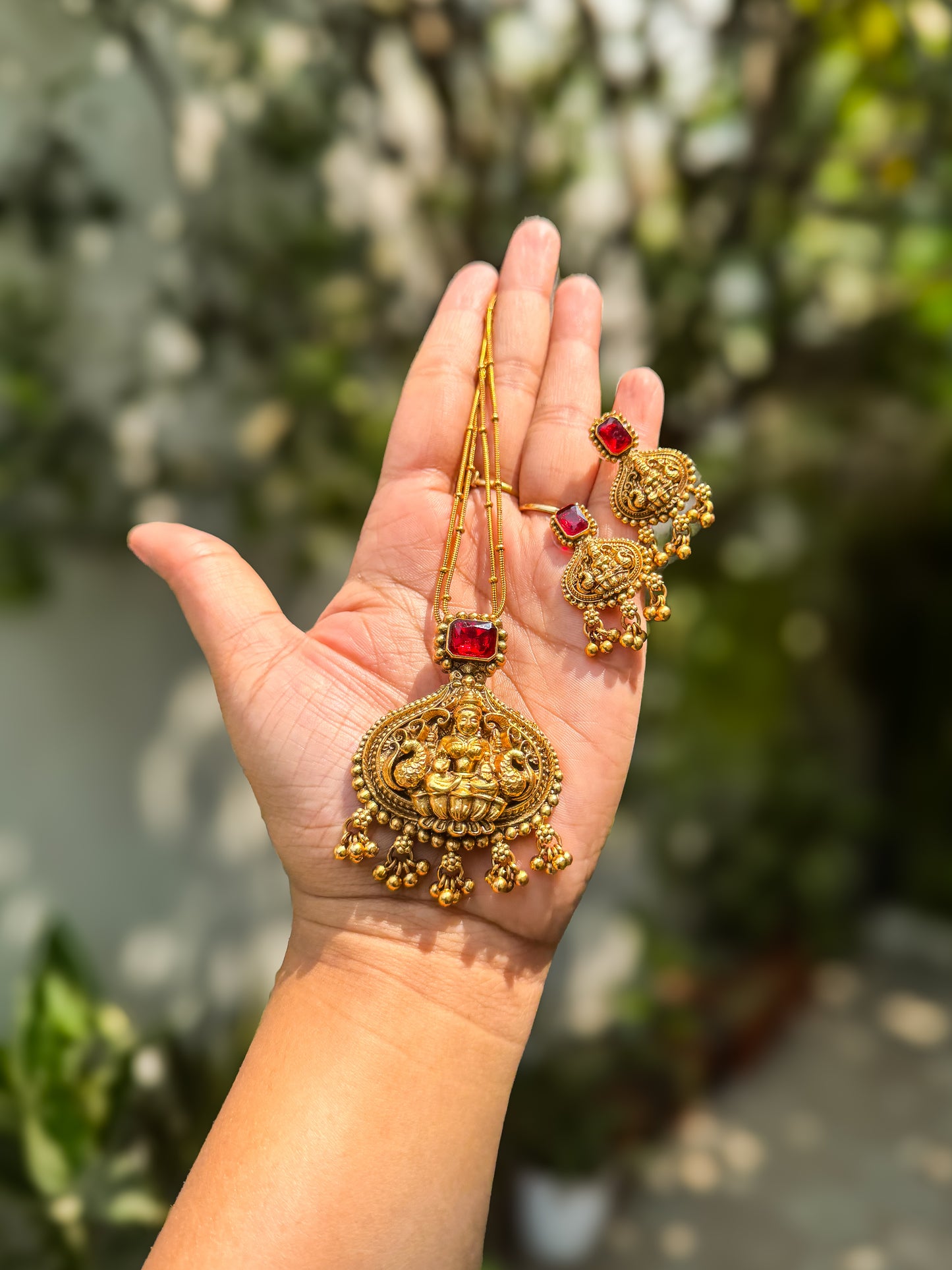 Simple Red stone worked lakshmi pendant with earring set