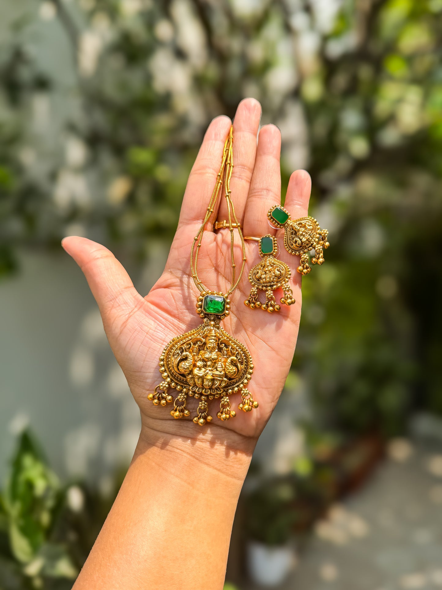 Simple green stone worked lakshmi pendant with earring set