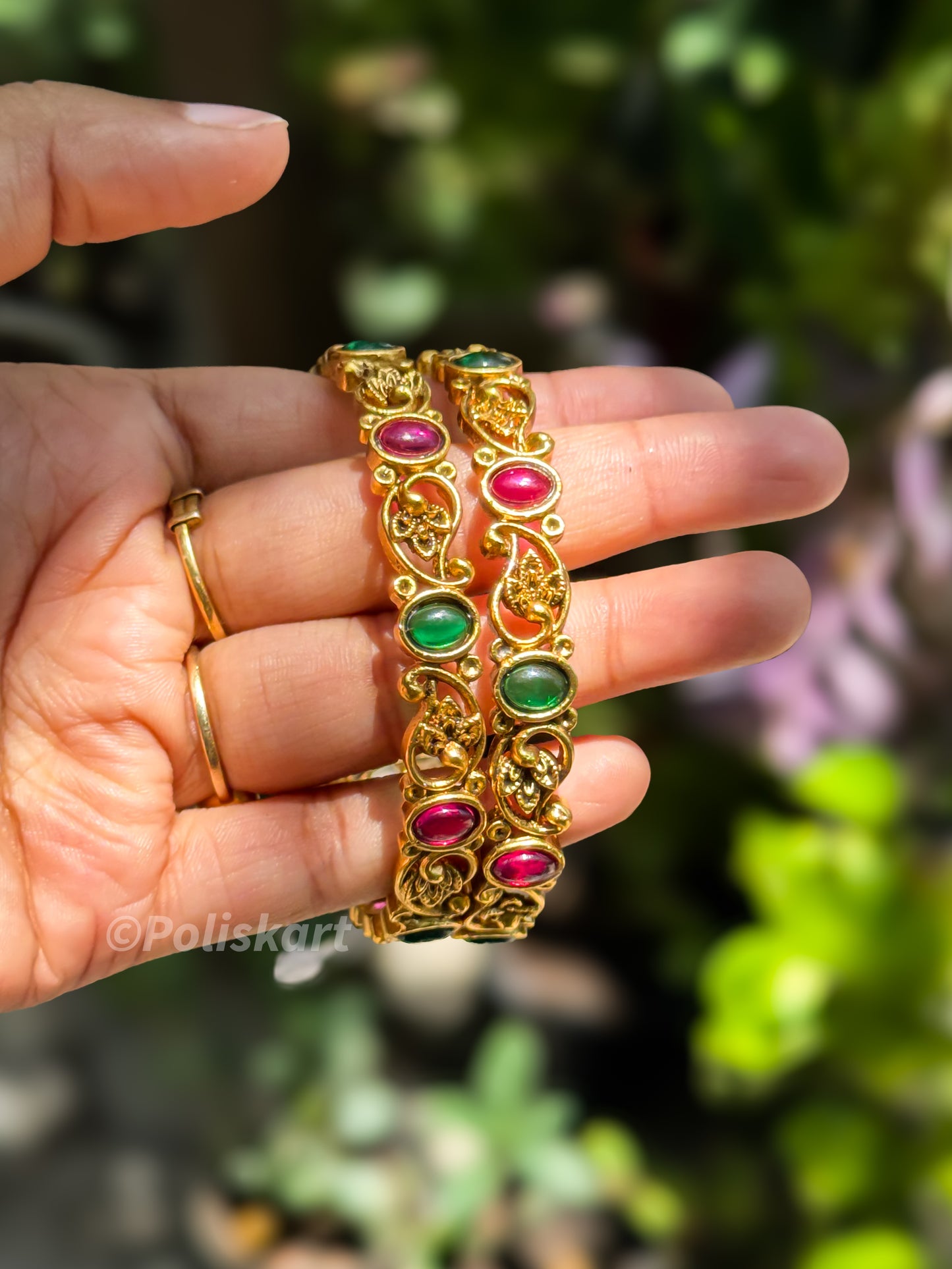 Pair of bangles Ruby and green stone worked