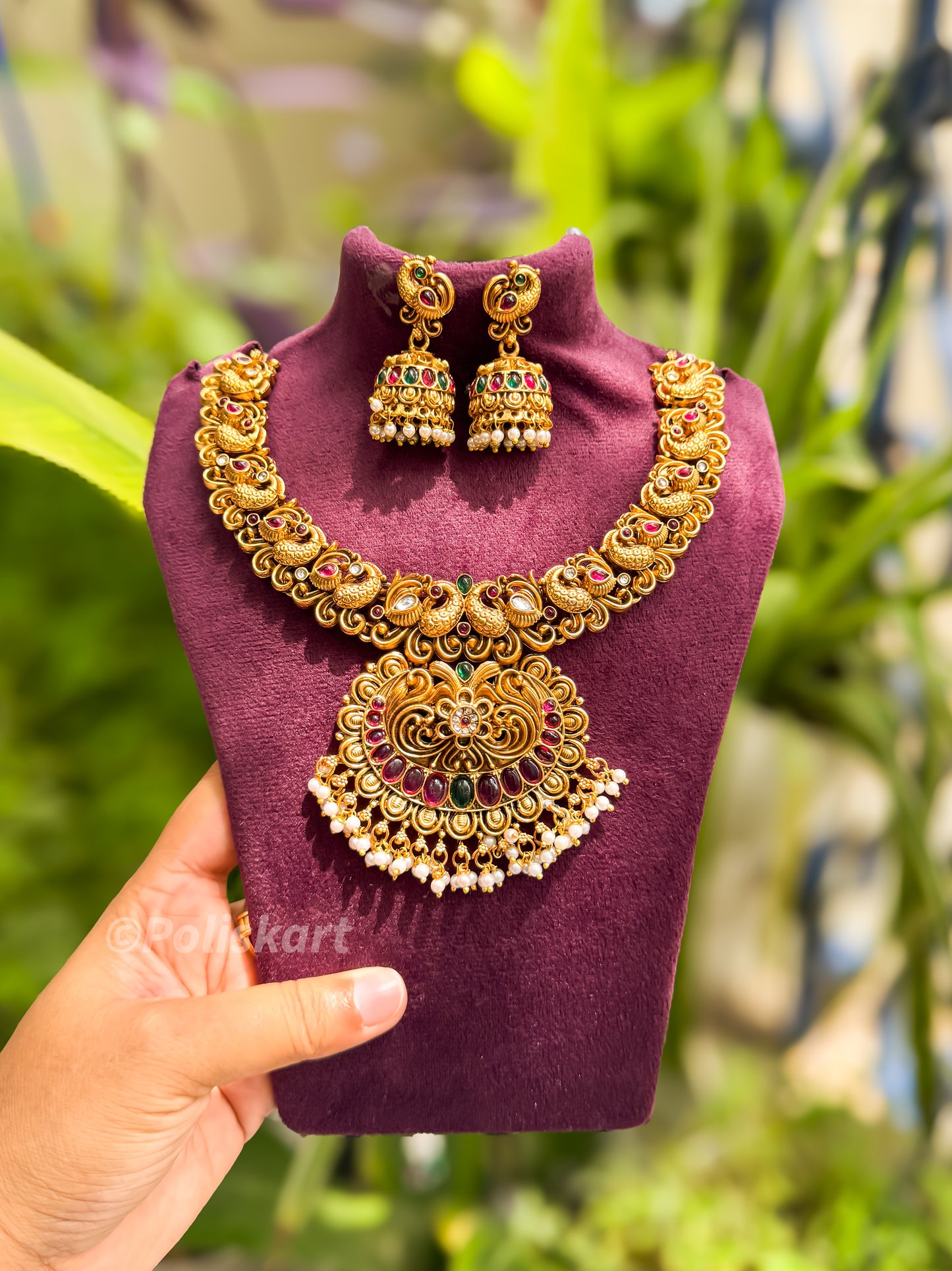 Heavy worked peacock necklace with jhumka set