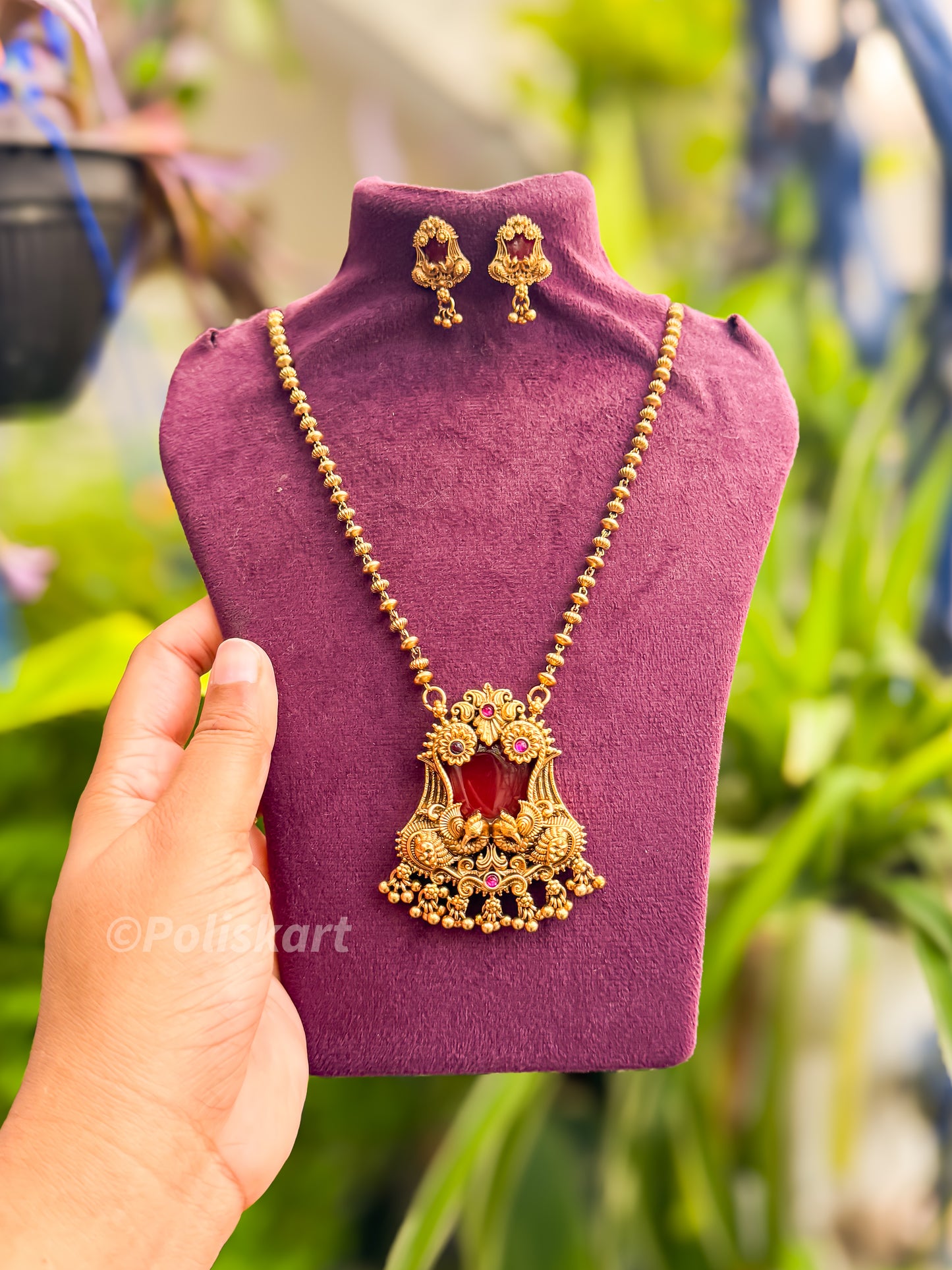 Chain with ruby stone and peacock pendant and earing set