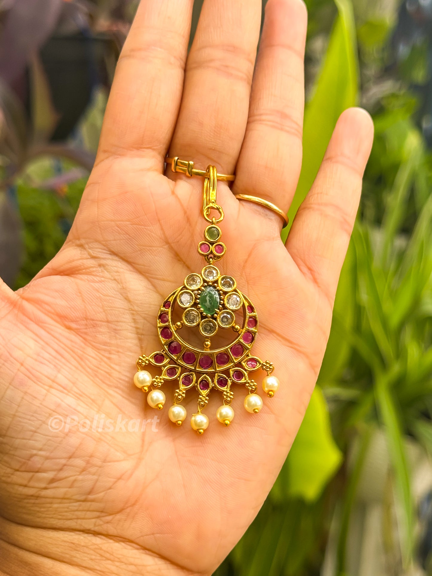 Tikka - Ruby and green stone worked design