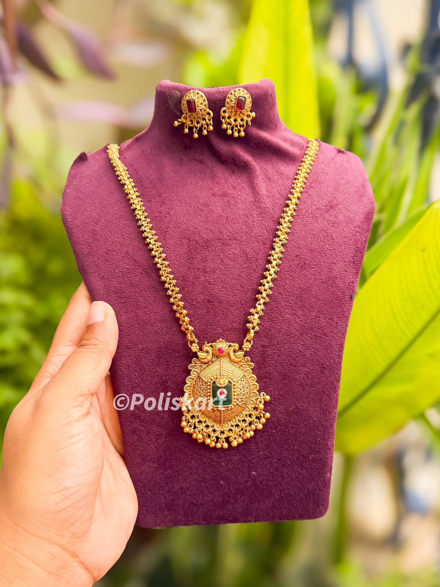Peacock and stone worked short haram with earing