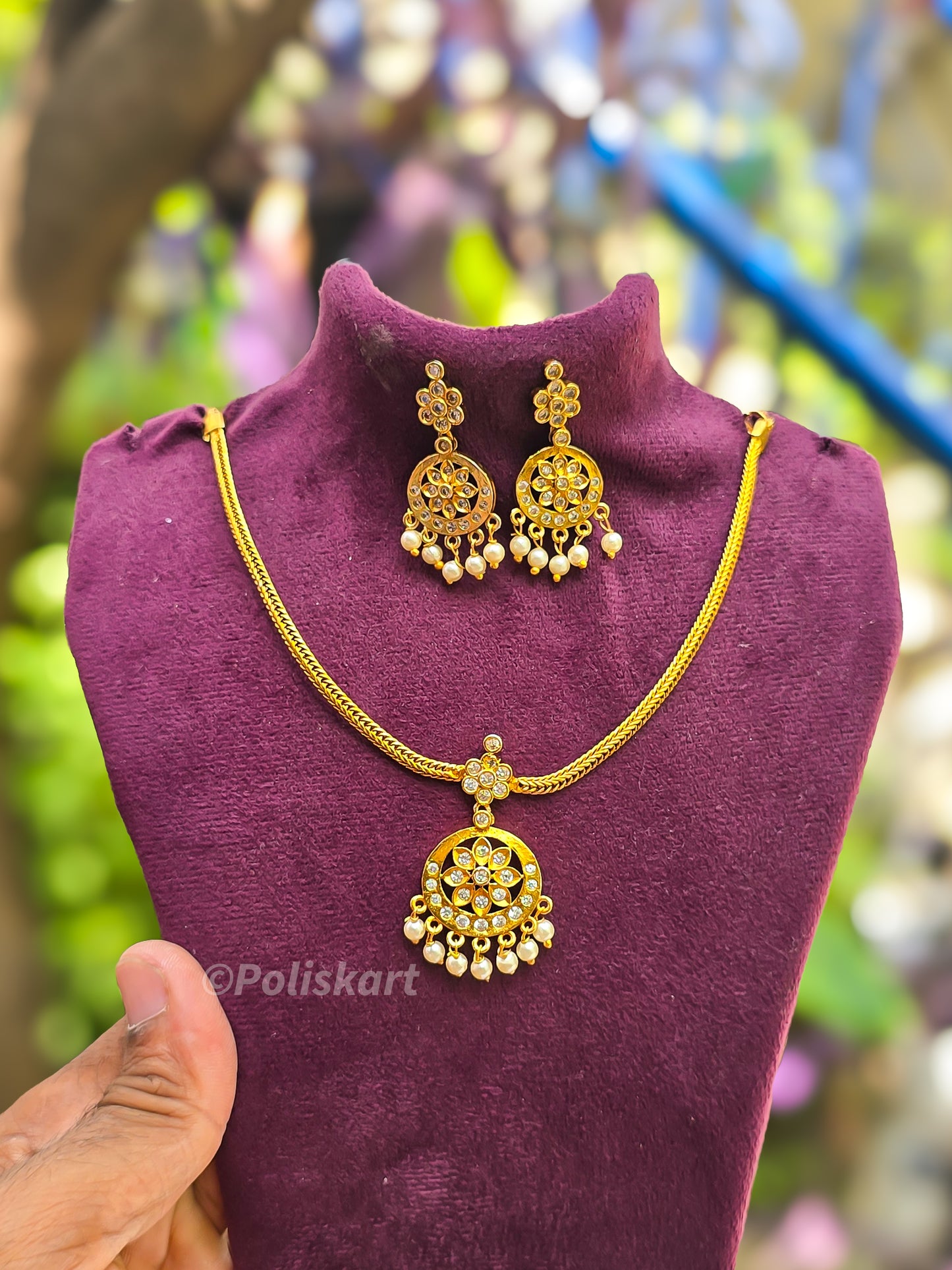 White stone worked circle design necklace with earing set