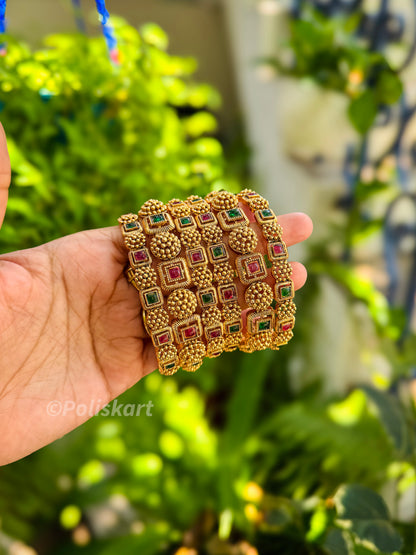 6 banges with red and green stone worked design