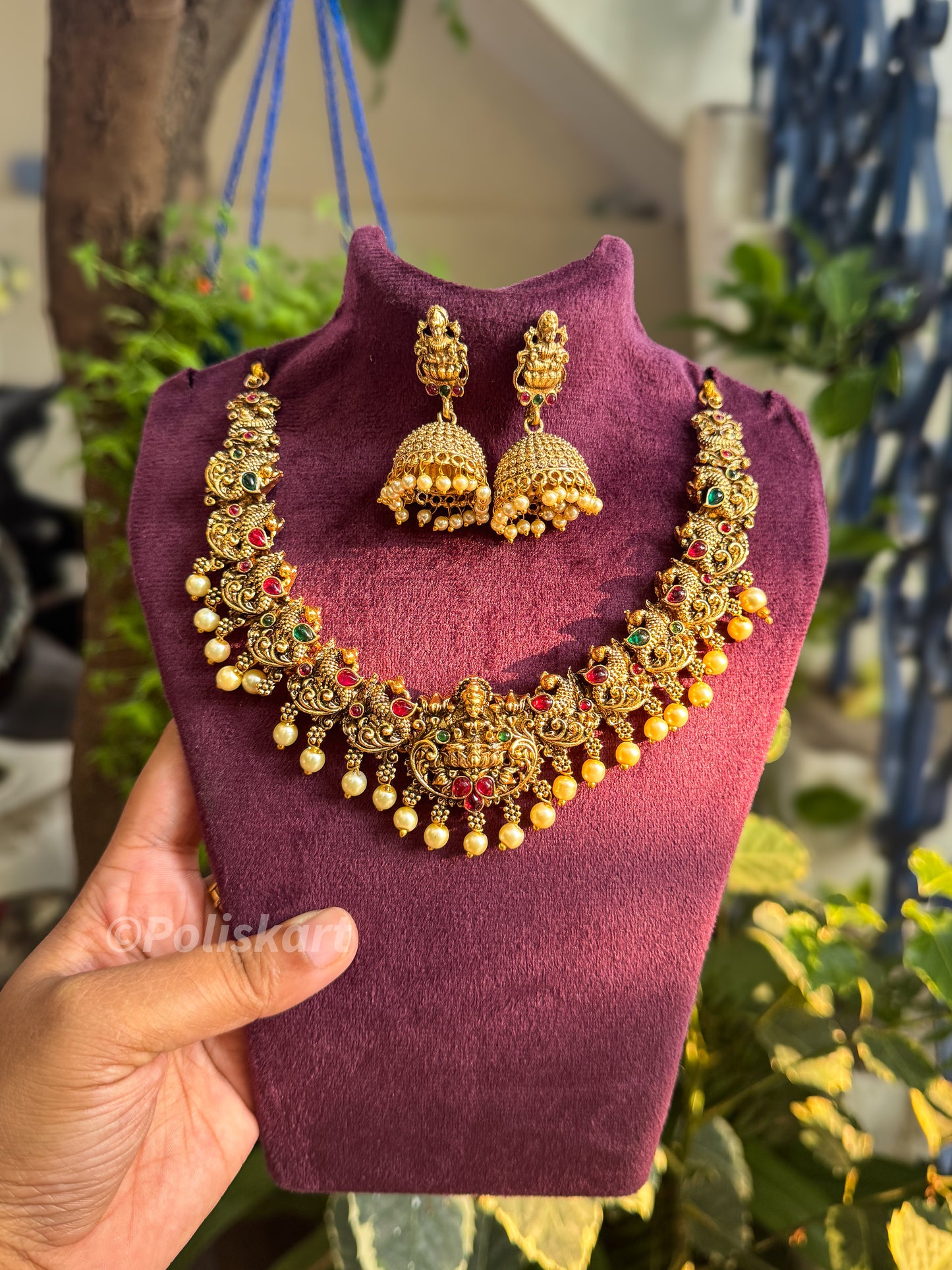 Trending pearl and lakshmi worked necklace with jhumka set