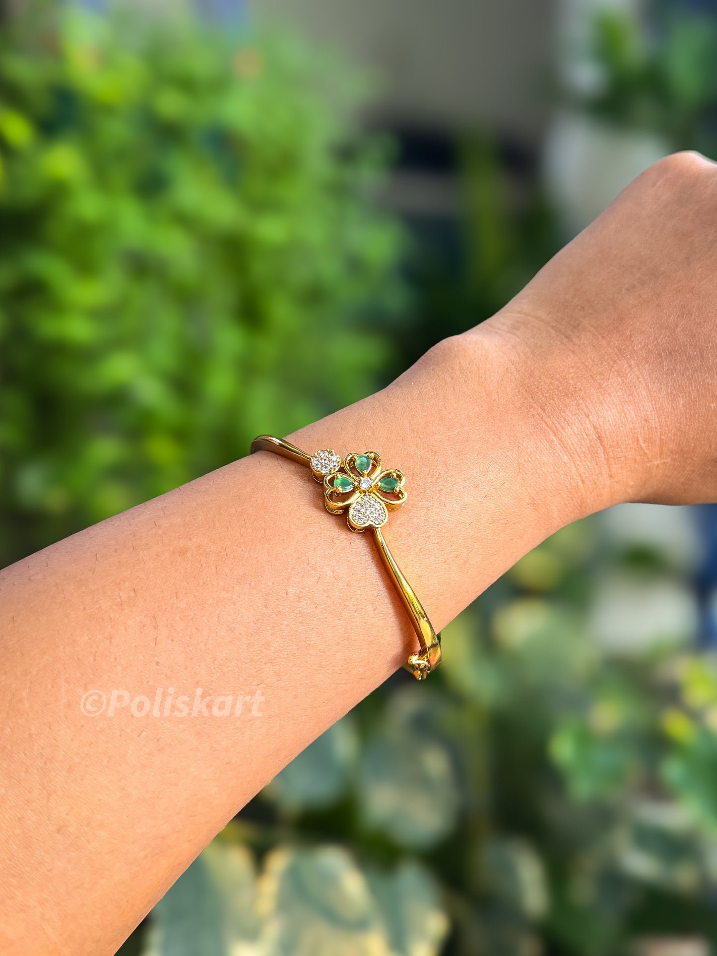 Free size bracelet bangle with white and green stone worked flower  design