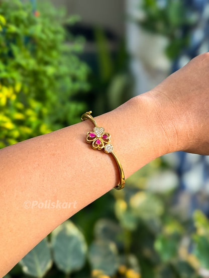 Free size bracelet bangle with white and red stone worked flower design