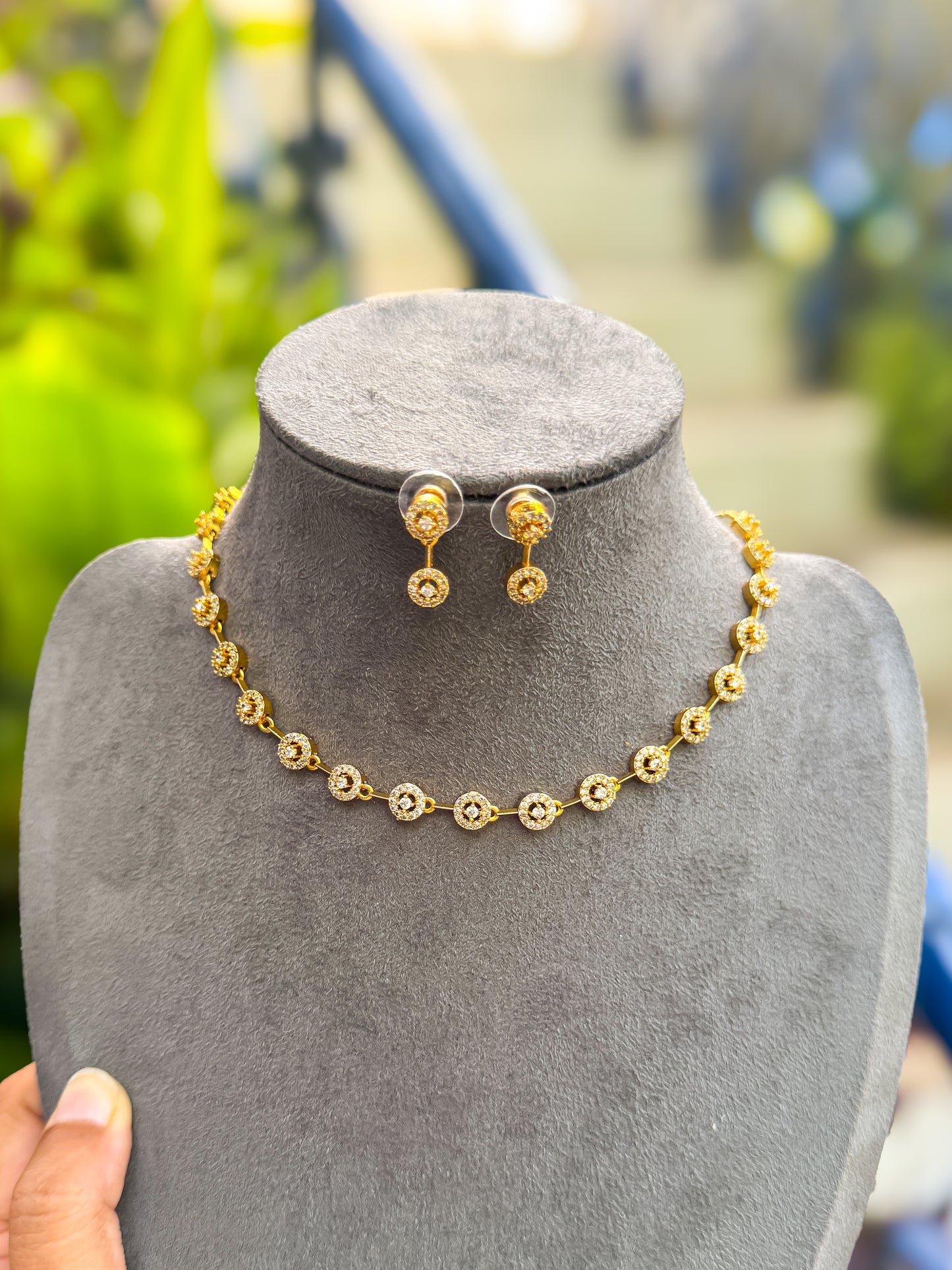 PK106 - Diamond finished circle stone necklace with earring set