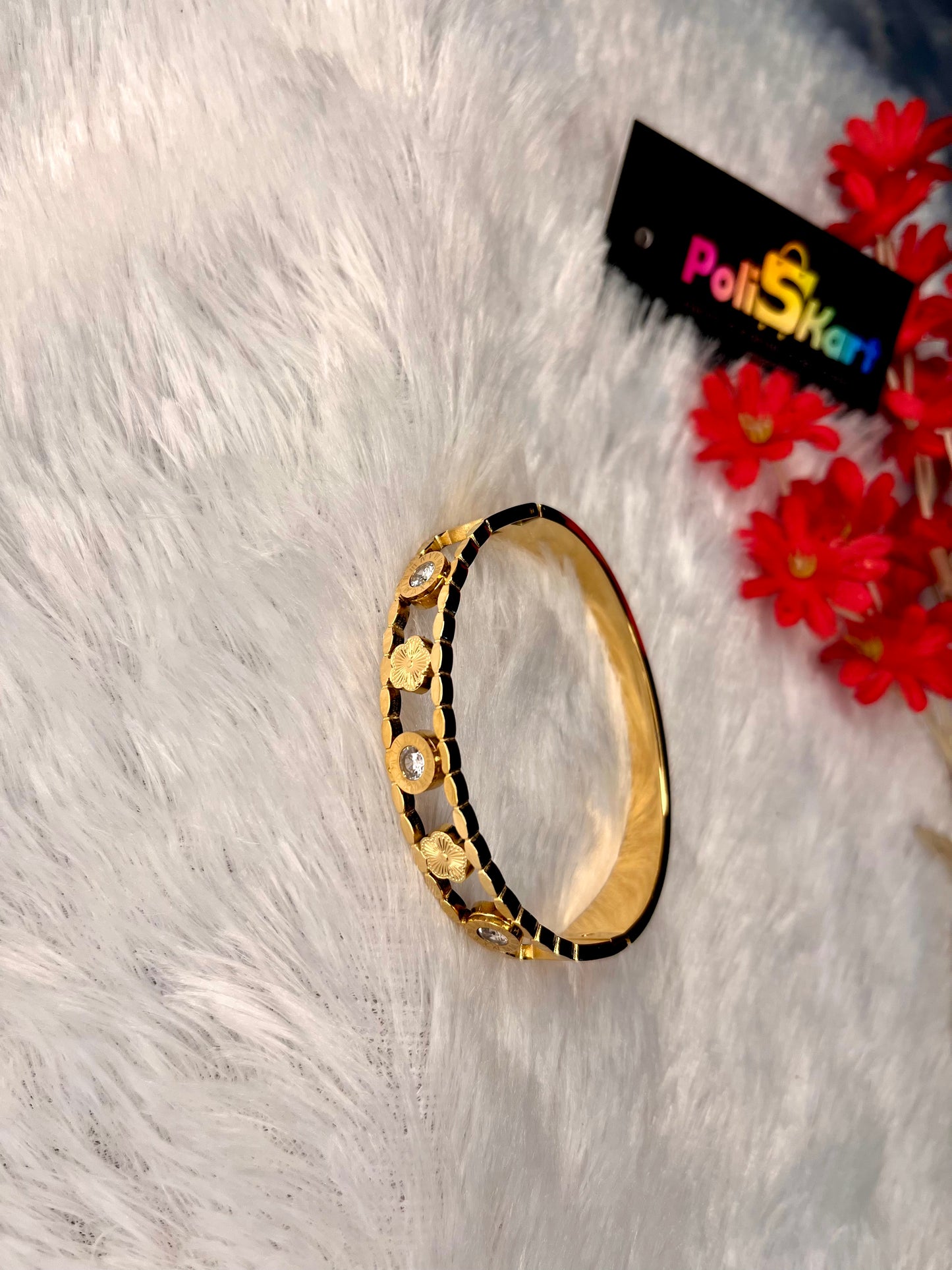 Cuff bangle with multi flower worked design