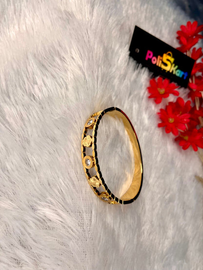 Cuff bangle with multi flower worked design