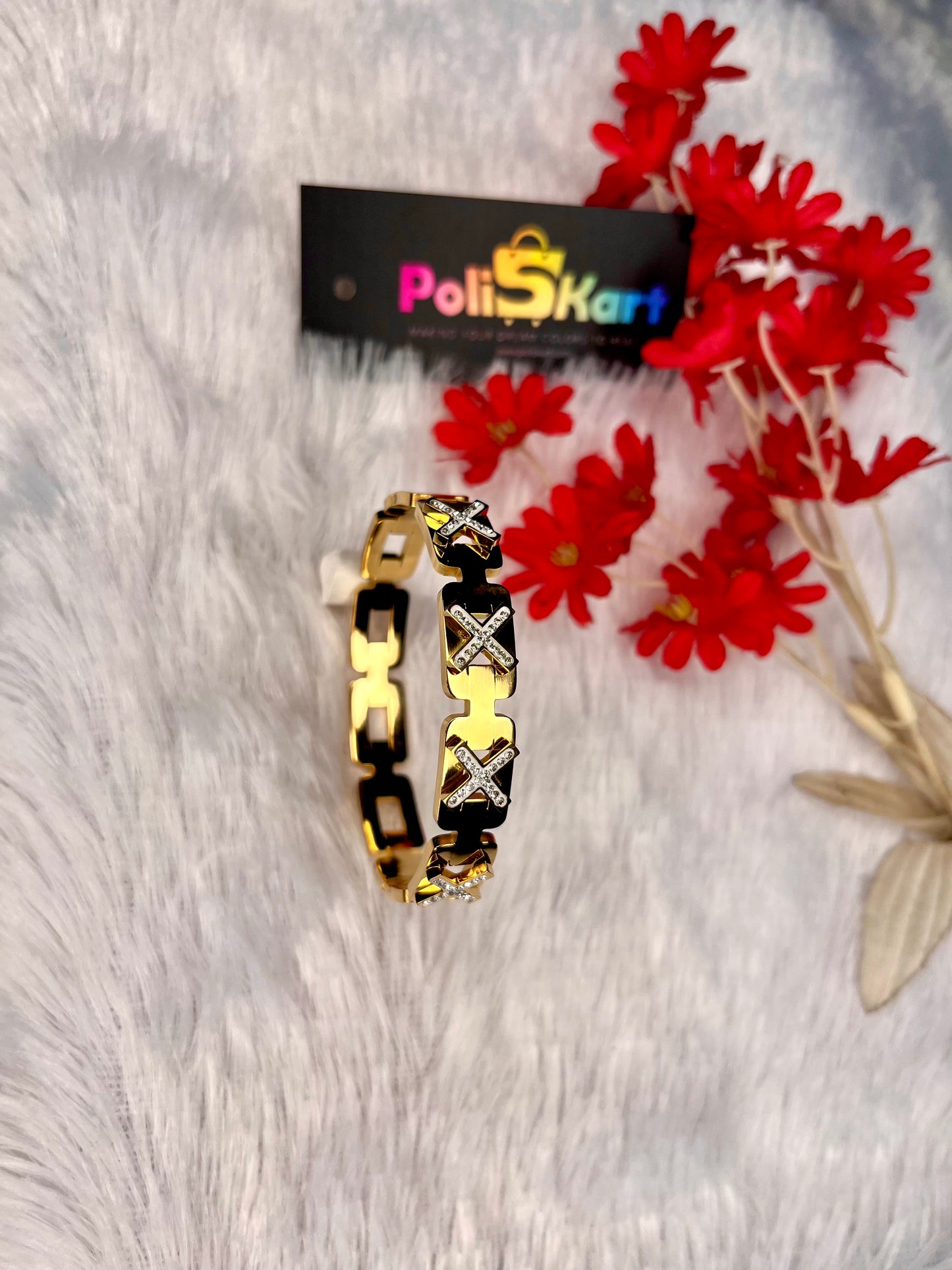 Cuff bangle with white stone worked design