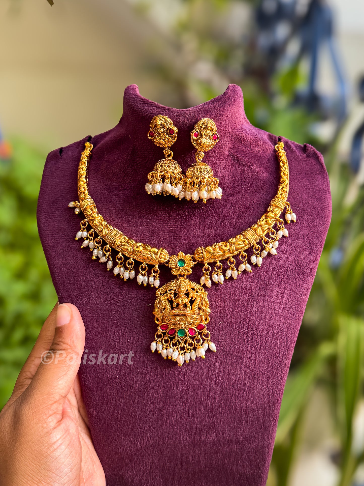 Pearl highlighted lakshmi necklace with jhumka set