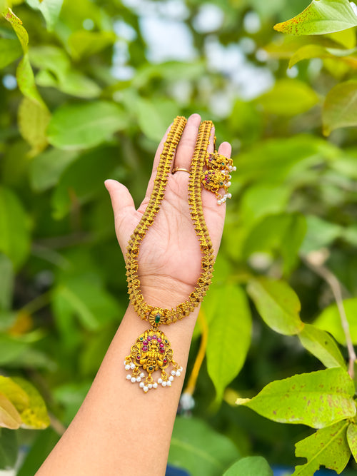 Simple rubi stone worked lakshmi haram with earing