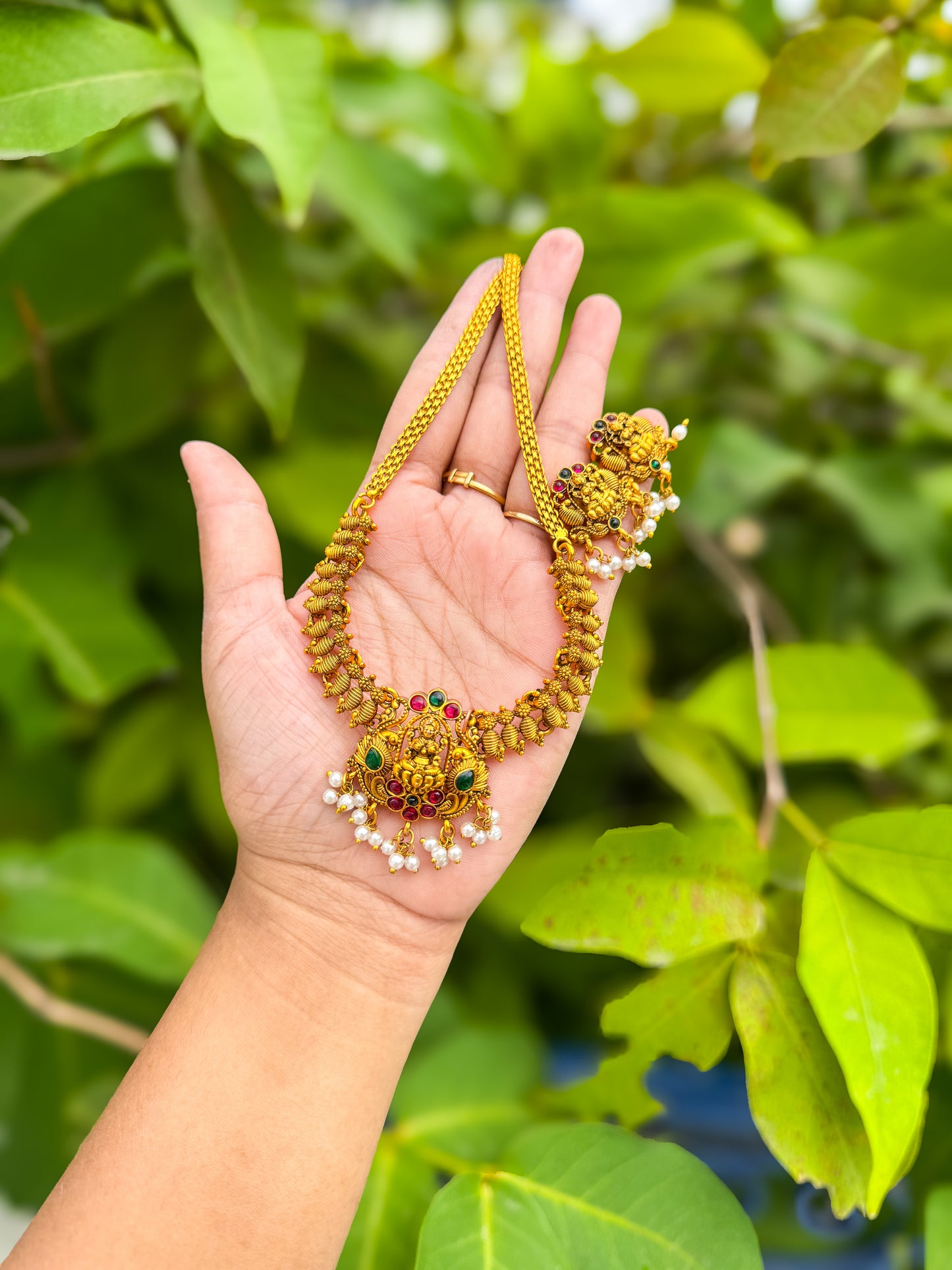 Simple rubi and green stone worked Lakshmi necklace with earing