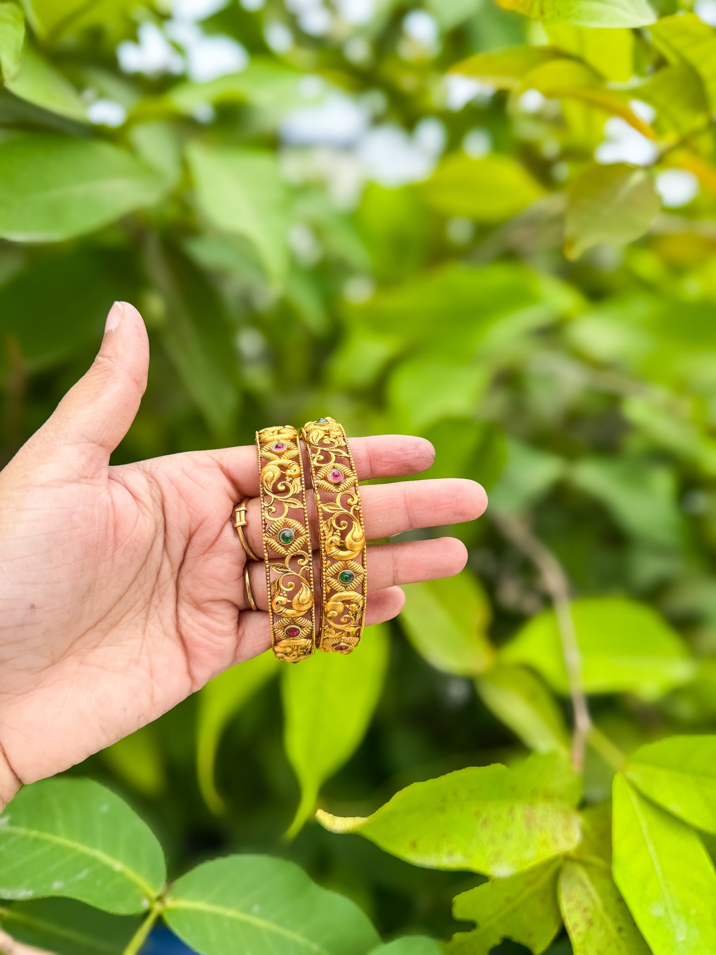2 Bangles set with peacock and flower designed