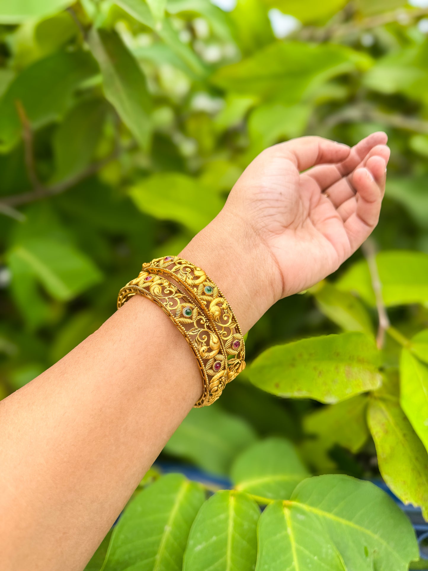 2 Bangles set with peacock and flower designed