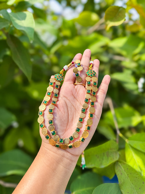 Double layered kasumala and green stone highlighted necklace with earring set