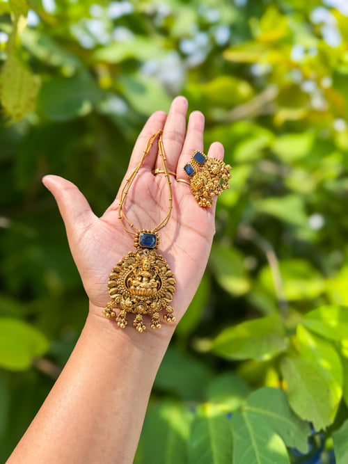 Simple chain with worked Lakshmi pendant and earring set - Dark blue color
