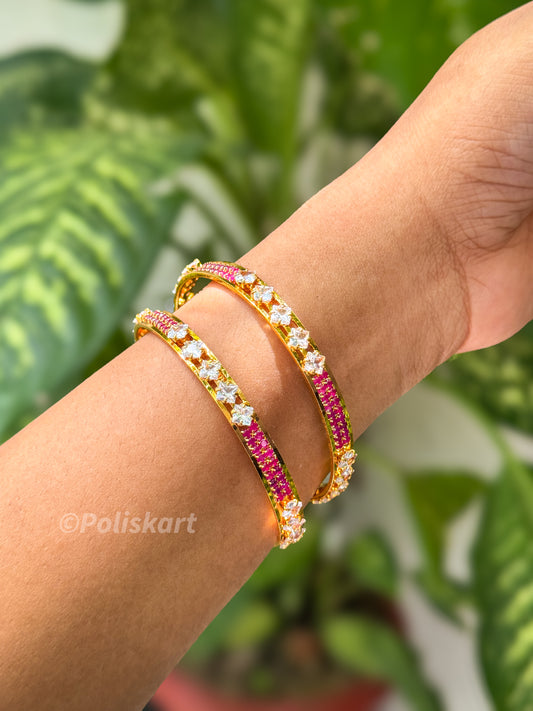 Pair of premium bangles with rubi and white stone worked