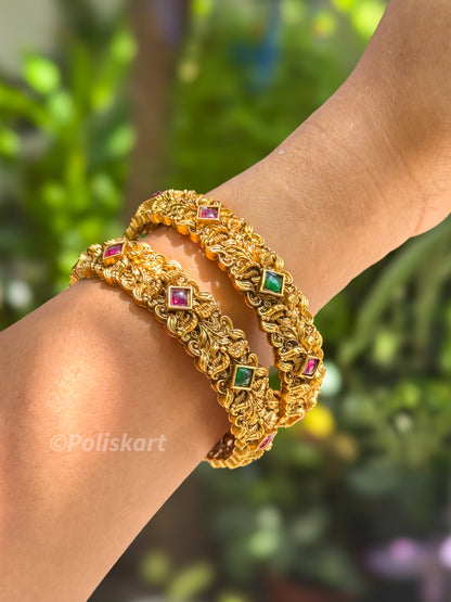 Pair of Green and rubi stone worked bangles