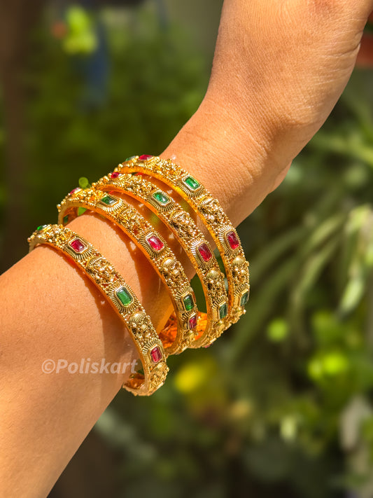 4 Bangles with  Green and rubi stone worked