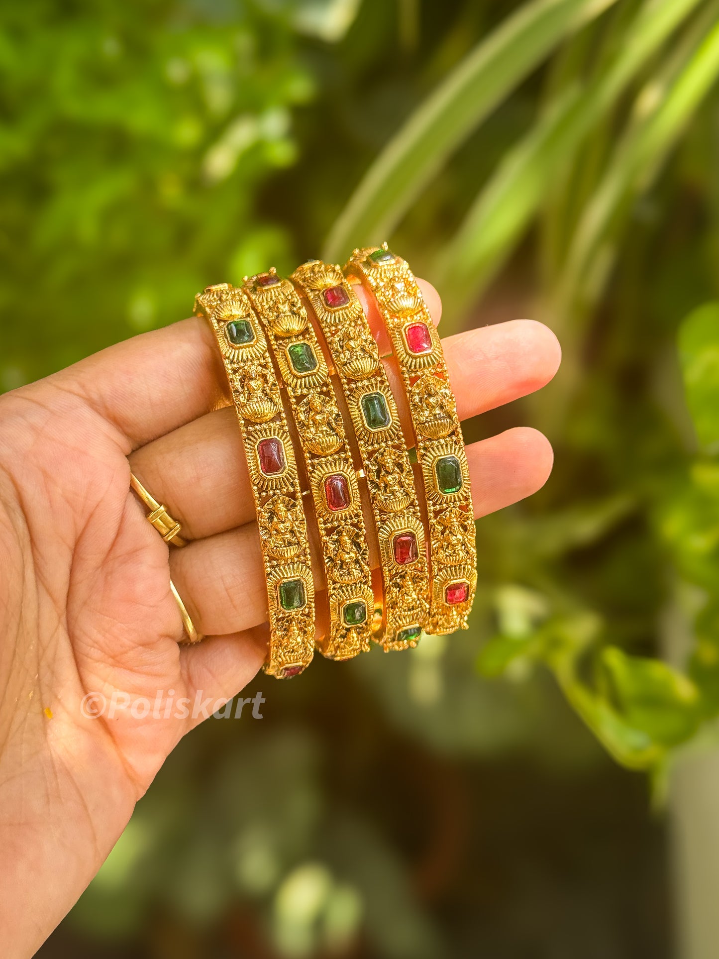 4 Bangles with  Green and rubi stone worked