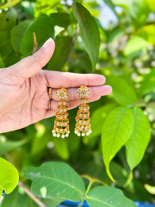 White stone worked curled Jhumka set