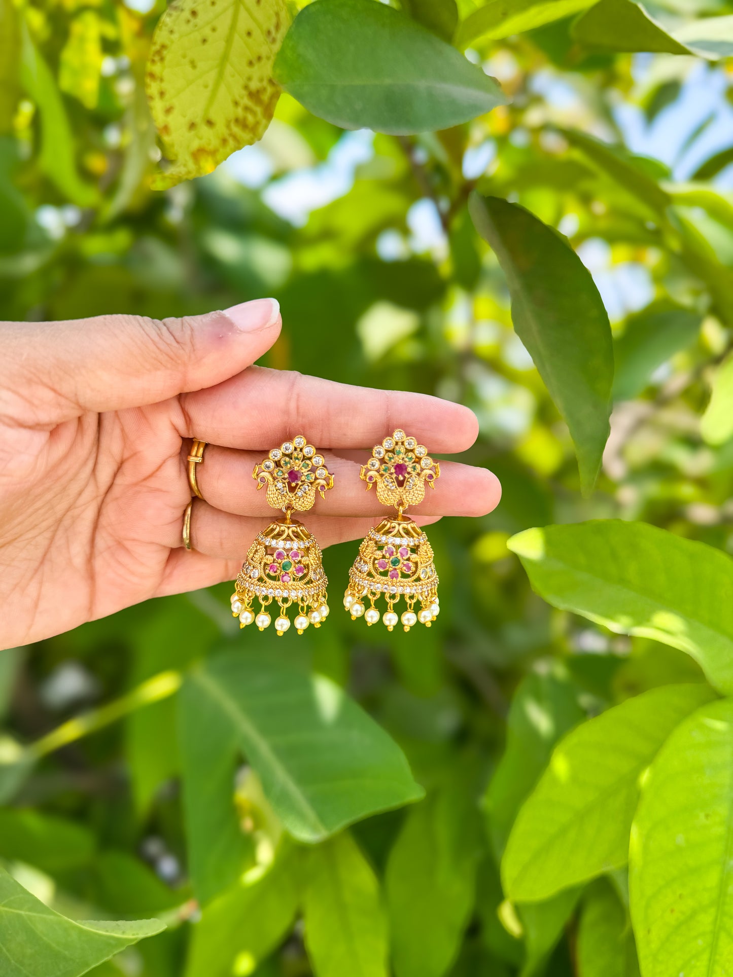 Premium Ad stone worked Peacock Jhumka set
