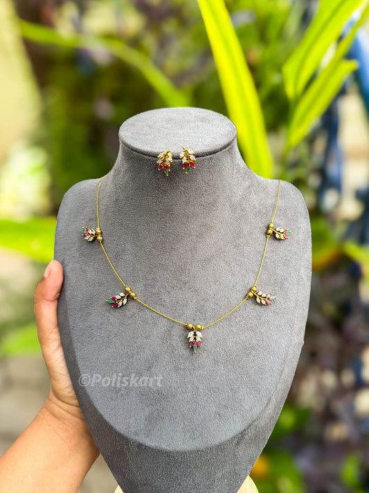 PK246 - Invisible chain with stone worked leaf design and earring set