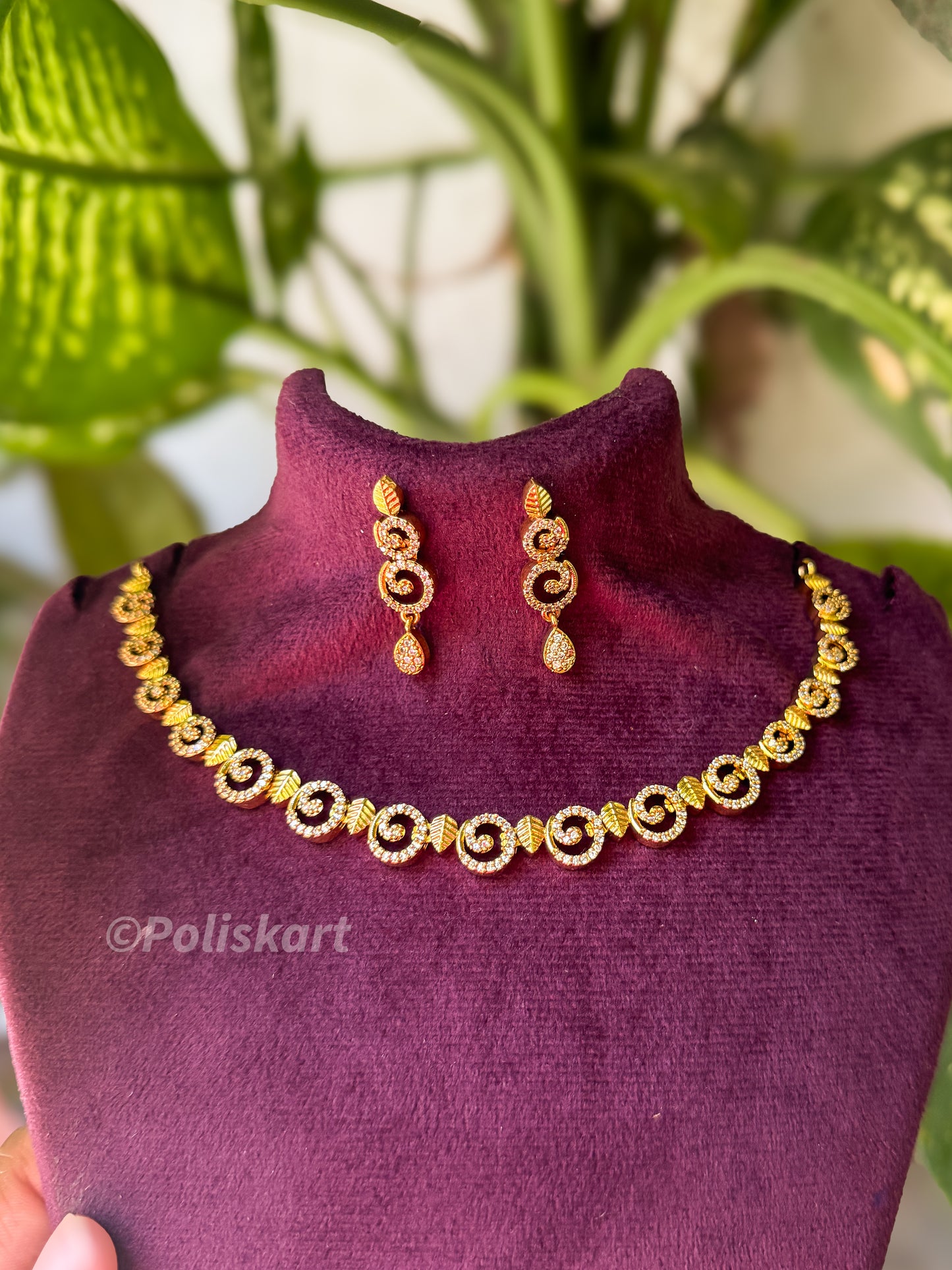 Daimon finished white stone necklace with earing