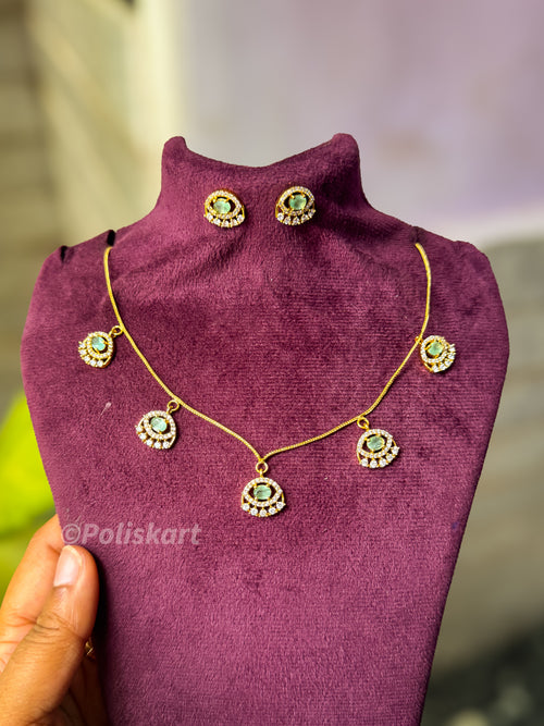 Simple Emarald and white stone necklace with earing