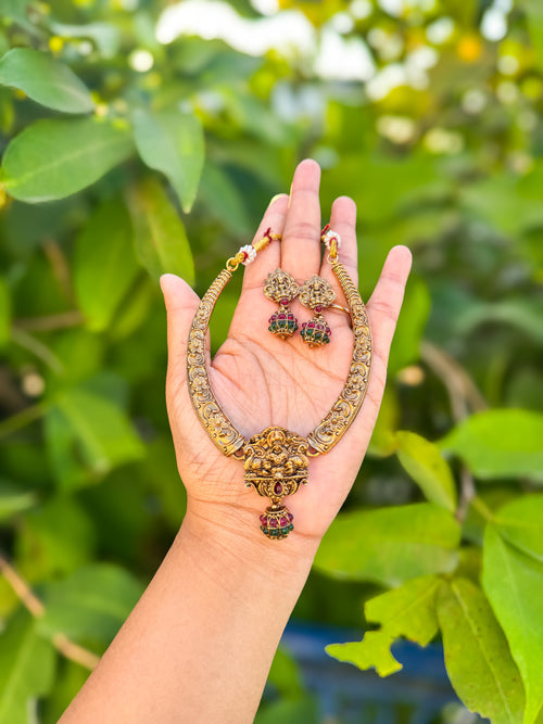 Red and ruby stone worked kundan necklace with earing set