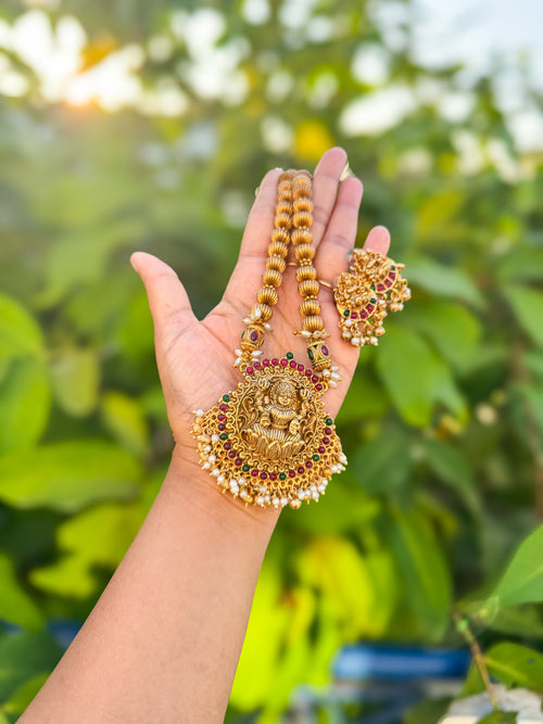Red and green stone worked Lakshmi  haram with earing set
