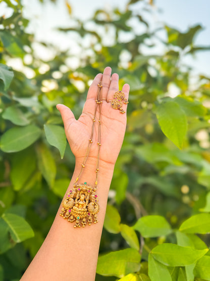 Double chain with Ruby stone worked lakshmi pendant with earing