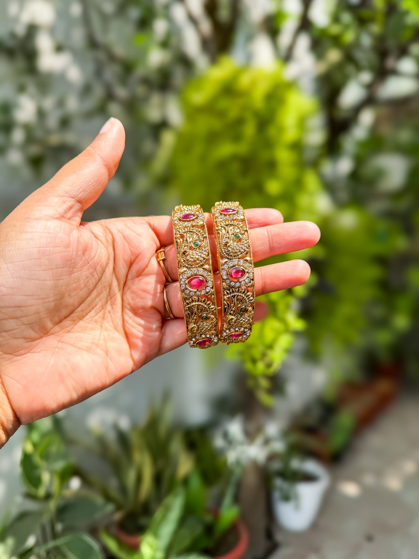 Pair of Peacock and stone worked bangles