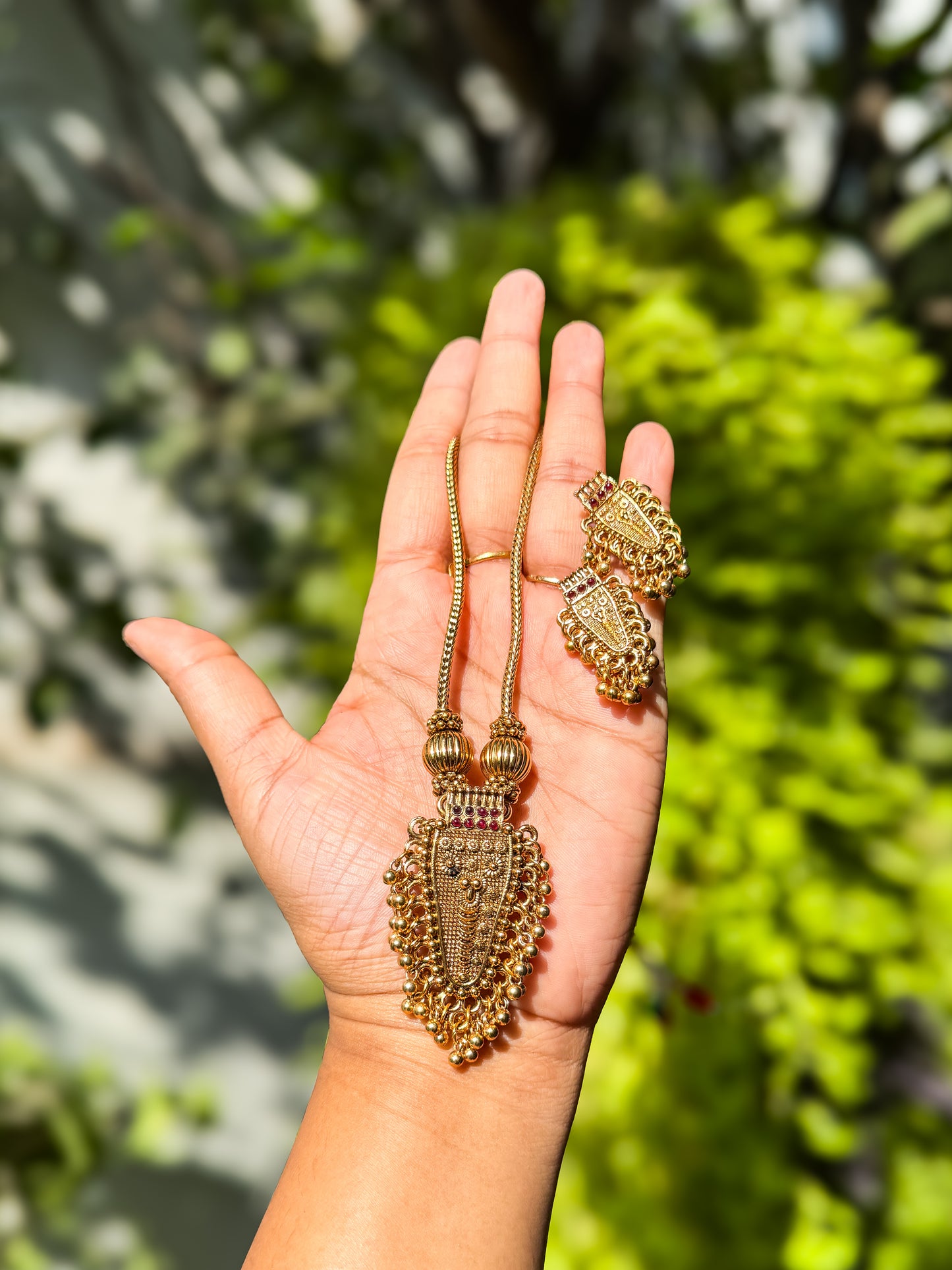 Simple and elegant Nettipattam designed neck piece with earing