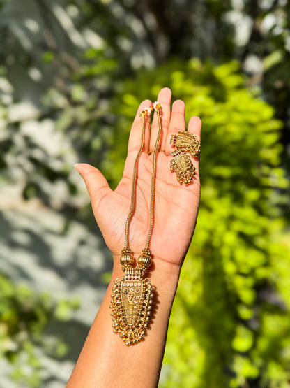 Simple and elegant Nettipattam designed neck piece with earing