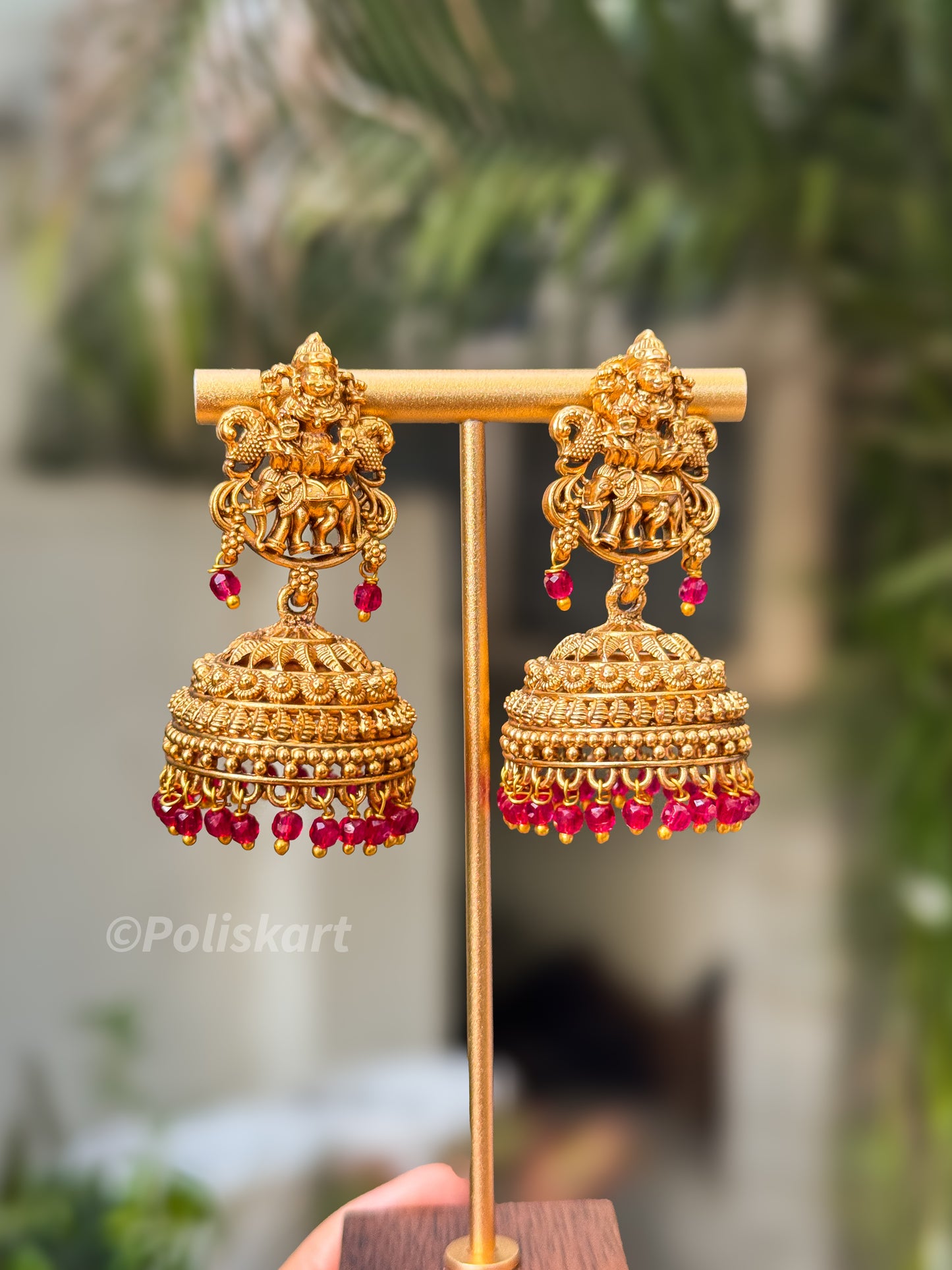 Stone worked lakshmi peacock elephant design jhumka set